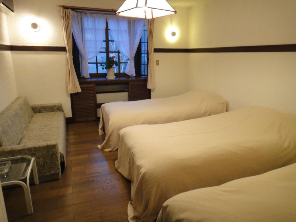Chalet La Neige Минаками Номер фото